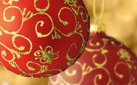 西方节日圣诞节元素红色金边圣诞球手机壁纸